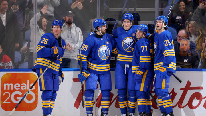 Mar 29, 2024; Buffalo, New York, USA;  Buffalo Sabres right wing Tage Thompson (72) celebrates his third goal of the game with teammates during the third period against the New Jersey Devils at KeyBank Center. Mandatory Credit: Timothy T. Ludwig-USA TODAY Sports