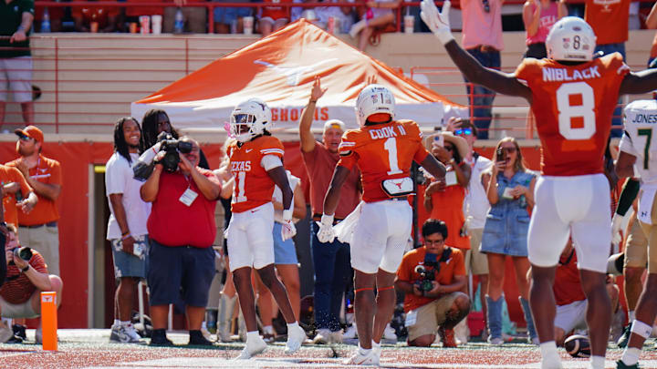 Aug 31, 2024; Austin, Texas, USA; Texas Longhorns wide receiver Silas Bolden (11) celebrates after a touchdown against the Colorado State Rams during the first half at Darrell K Royal-Texas Memorial Stadium. Mandatory Credit: Aaron Meullion-Imagn Images