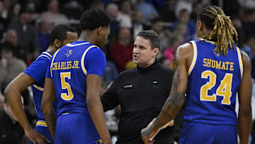 McNeese coach Will Wade talks with his players during the first half against Clemson on Thursday in Providence, R.I. 