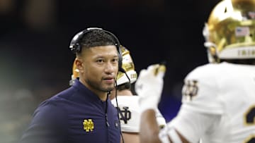 Jan 2, 2025; New Orleans, LA, USA; Notre Dame Fighting Irish head coach Marcus Freeman looks on from the sidelines against the Georgia Bulldogs during the first half at Caesars Superdome. 