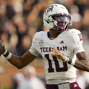 Nov 8, 2025; Columbia, Missouri, USA; Texas A&M Aggies quarterback Marcel Reed (10) throws a pass during the first half against the Missouri Tigers at Faurot Field at Memorial Stadium. Mandatory Credit: Jay Biggerstaff-Imagn Images