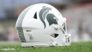 Sep 7, 2024; College Park, Maryland, USA; A detailed view of Michigan State Spartans helmet on the field before the game against the Maryland Terrapins at SECU Stadium. Mandatory Credit: Tommy Gilligan-Imagn Images