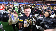 Dec 29, 2023; Arlington, TX, USA; Missouri Tigers quarterback Brady Cook (12) talks to the media after the game against the Ohio State Buckeyes at AT&T Stadium. Mandatory Credit: Tim Heitman-USA TODAY Sports