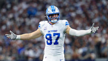 Oct 13, 2024; Arlington, Texas, USA;  Detroit Lions defensive end Aidan Hutchinson (97) reacts during the second quarter against the Dallas Cowboys at AT&T Stadium. Mandatory Credit: Kevin Jairaj-Imagn Images