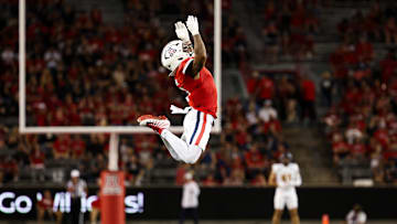 Sep 7, 2024; Tucson, Arizona, USA; Arizona Wildcats linebacker Justin Flowe (0) jumps in excitement as Arizona Wildcats go into kickoff against Northern Arizona Lumberjacks during first quarter at Arizona Stadium. Mandatory Credit: Aryanna Frank-Imagn Images