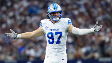 Oct 13, 2024; Arlington, Texas, USA;  Detroit Lions defensive end Aidan Hutchinson (97) reacts during the second quarter against the Dallas Cowboys at AT&T Stadium. Mandatory Credit: Kevin Jairaj-Imagn Images