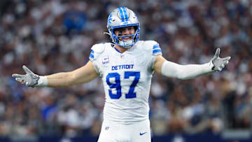 Oct 13, 2024; Arlington, Texas, USA;  Detroit Lions defensive end Aidan Hutchinson (97) reacts during the second quarter against the Dallas Cowboys at AT&T Stadium. Mandatory Credit: Kevin Jairaj-Imagn Images