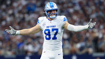 Oct 13, 2024; Arlington, Texas, USA;  Detroit Lions defensive end Aidan Hutchinson (97) reacts during the second quarter against the Dallas Cowboys at AT&T Stadium. Mandatory Credit: Kevin Jairaj-Imagn Images