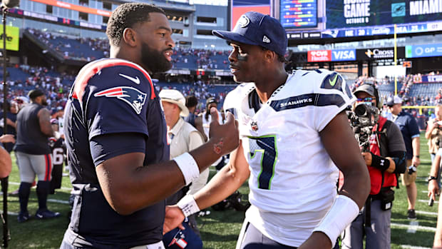 New England Patriots quarterback Jacoby Brissett and Seattle Seahawks quarterback Geno Smith