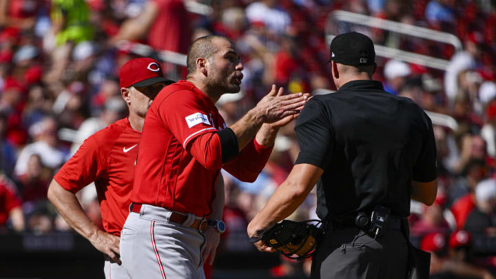 Joey Votto of the Cincinnati Reds argues with an umpire