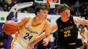Greenfield-Central Cougars guard Braylon Mullins (24) rushes up the court against Mt. Vernon Marauders Tanner Teschendorf (22) on Saturday, March 8, 2025, during the IHSAA boys basketball sectional final at Muncie Fieldhouse in Muncie. Mt. Vernon Marauders defeated the Greenfield-Central Cougars in double overtime, 76-73.