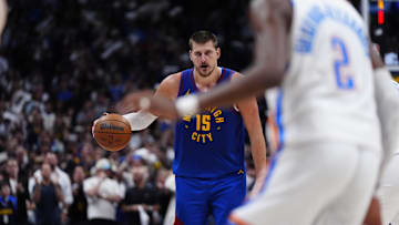 May 9, 2025; Denver, Colorado, USA; Denver Nuggets center Nikola Jokic (15) controls the ball in the second half against the Oklahoma City Thunder during game three of the second round for the 2025 NBA Playoffs at Ball Arena. Mandatory Credit: Ron Chenoy-Imagn Images