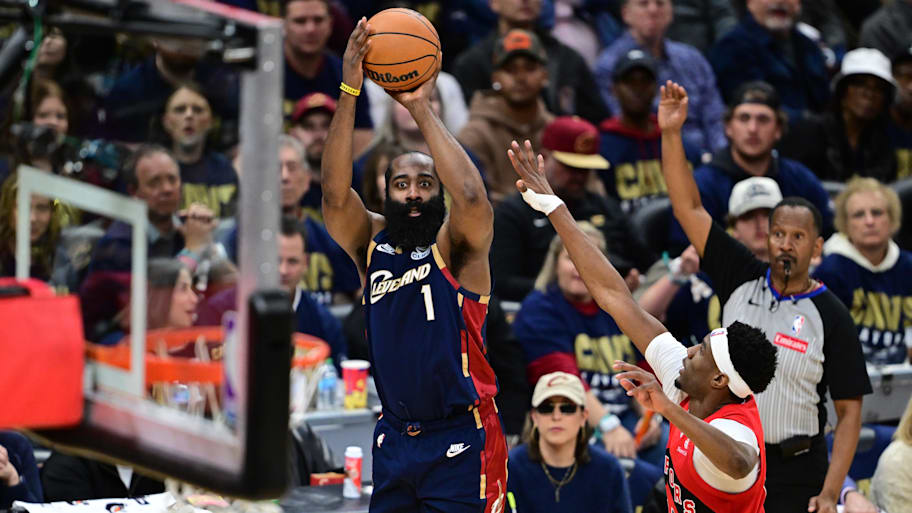 Cavaliers guard James Harden shoots a three-pointer over Raptors guard Ja’Kobe Walter during Monday’s Game 2.