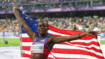 Aug 3, 2024; Paris, FRANCE; Jasmine Moore (USA) celebrates after her third place finish in the women's triple jump final during the Paris 2024 Olympic Summer Games at Stade de France. Mandatory Credit: Kirby Lee-USA TODAY Sports