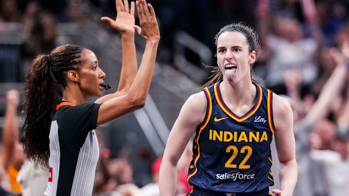 Indiana Fever guard Caitlin Clark (22) celebrates after scoring a 3-pointer Saturday, June 14, 2025, during a game between the Indiana Fever and the New York Liberty at Gainbridge Fieldhouse in Indianapolis. Indiana Fever guard Caitlin Clark (22) celebrates after scoring a 3-pointer Saturday, June 14, 2025, during a game between the Indiana Fever and the New York Liberty at Gainbridge Fieldhouse in Indianapolis.