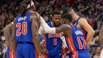 Apr 10, 2025; Detroit, Michigan, USA; Detroit Pistons guard Dennis Schroder (17) talks to teammates on a play stoppage against the New York Knicks during the first half at Little Caesars Arena. Mandatory Credit: David Reginek-Imagn Images