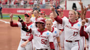 Oklahoma's Ailana Agbayani (50) celebrates after hitting a three-run home run in the second inning of a softball game in the Norman Regional of the NCAA Tournament between the University of Oklahoma Sooners (OU) and the California Golden Bears at Love's Field in Norman, Okla., Sunday, May 18, 2025. Oklahoma won 12-1.