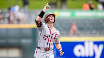 May 24, 2024; Charlotte, NC, USA; Florida State Seminoles outfielder James Tibbs III (22) celebrates his eighth inning homer against the Virginia Cavaliers during the ACC Baseball Tournament at Truist Field. 