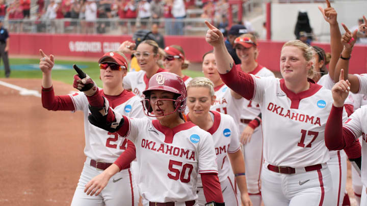 Oklahoma's Ailana Agbayani (50) celebrates after hitting a three-run home run in the second inning of a softball game in the Norman Regional of the NCAA Tournament between the University of Oklahoma Sooners (OU) and the California Golden Bears at Love's Field in Norman, Okla., Sunday, May 18, 2025. Oklahoma won 12-1.