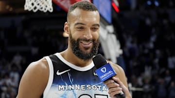 Apr 11, 2025; Minneapolis, Minnesota, USA; Minnesota Timberwolves center Rudy Gobert (27) smiles during an interview after the game against the Brooklyn Nets at Target Center. Mandatory Credit: Bruce Kluckhohn-Imagn Images