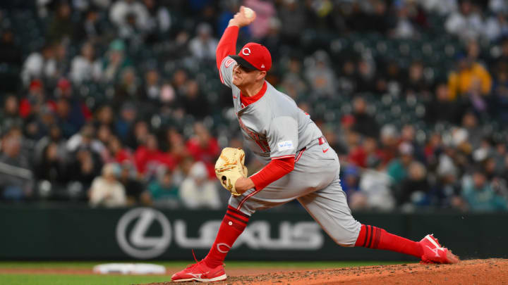 Apr 16, 2024; Seattle, Washington, USA; Cincinnati Reds relief pitcher Emilio Pagan (15) pitches to the Seattle Mariners during the fifth inning at T-Mobile Park. Mandatory Credit: Steven Bisig-USA TODAY Sports