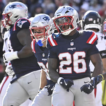 Nov 2, 2025; Foxborough, Massachusetts, USA; New England Patriots running back Terrell Jennings (26) celebrates his touchdown against the Atlanta Falcons during the first half at Gillette Stadium. Mandatory Credit: Eric Canha-Imagn Images
