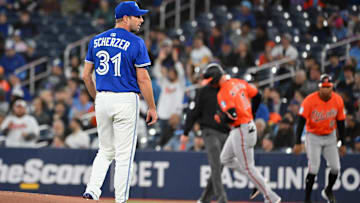 Mar 29, 2025: Toronto Blue Jays pitcher Max Scherzer (31) waits for a new ball as Baltimore Orioles second baseman Jordan Westburg (11) rounds the bases after hitting a solo home run in the first inning at Rogers Centre. 