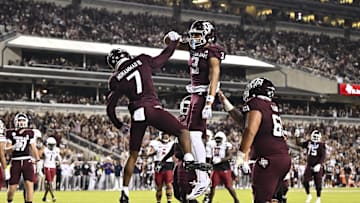 Nov 16, 2024; College Station, Texas, USA; Texas A&M Aggies wide receiver Moose Muhammad III (7) celebrates after scoring a touchdown during the second quarter with wide receiver Noah Thomas (3) against the New Mexico State Aggies at Kyle Field. Mandatory Credit: Maria Lysaker-Imagn Images 