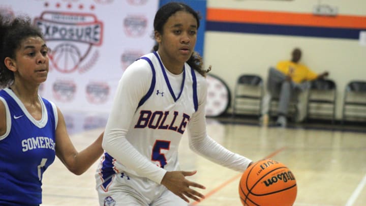 Bolles guard Evie Freeman (5) dribbles as North Lauderdale Somerset Prep guard Lacienega Crockett (1) defends during an Insider Exposure Thanksgiving Classic high school girls basketball game on November 27, 2024. [Clayton Freeman/Florida Times-Union]