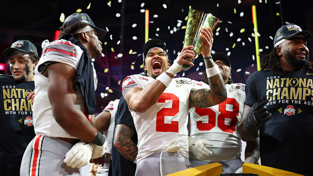 Jan 20, 2025; Atlanta, GA, USA; Ohio State Buckeyes wide receiver Emeka Egbuka (2) celebrates after winning against the Notre Dame Fighting Irish in the CFP National Championship college football game at Mercedes-Benz Stadium. Mandatory Credit: Mark J. Rebilas-Imagn Images