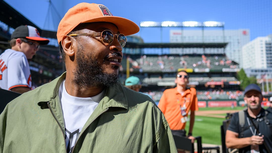 Sep 8, 2024; Baltimore, Maryland, USA; Former professional basketball player Carmelo Anthony looks on after the game between the Baltimore Orioles and the Tampa Bay Rays at Oriole Park at Camden Yards. Mandatory Credit: Reggie Hildred-Imagn Images