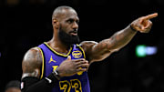 Mar 8, 2025; Boston, Massachusetts, USA; Los Angeles Lakers forward LeBron James (23) calls a play against the Boston Celtics during the second quarter at the TD Garden. Mandatory Credit: Brian Fluharty-Imagn Images