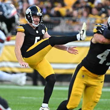 Aug 9, 2024; Pittsburgh, Pennsylvania, USA;  Pittsburgh Steelers punter Cameron Johnston (5) punts against the Houston Texans during the first quarter at Acrisure Stadium. Mandatory Credit: Barry Reeger-Imagn Images