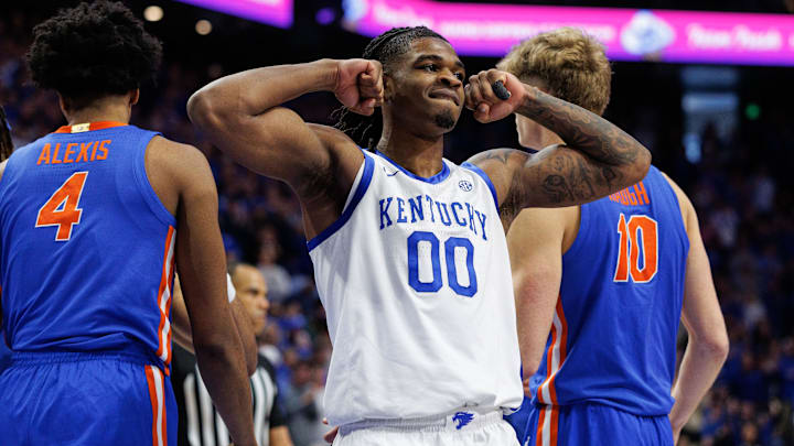 Jan 4, 2025; Lexington, Kentucky, USA; Kentucky Wildcats guard Otega Oweh (0) celebrates a basket by center Amari Williams during the second half against the Florida Gators at Rupp Arena at Central Bank Center. Mandatory Credit: Jordan Prather-Imagn Images