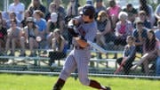Colt Emerson, of John Glenn, takes a swing during a Division II sectional final against host Morgan.