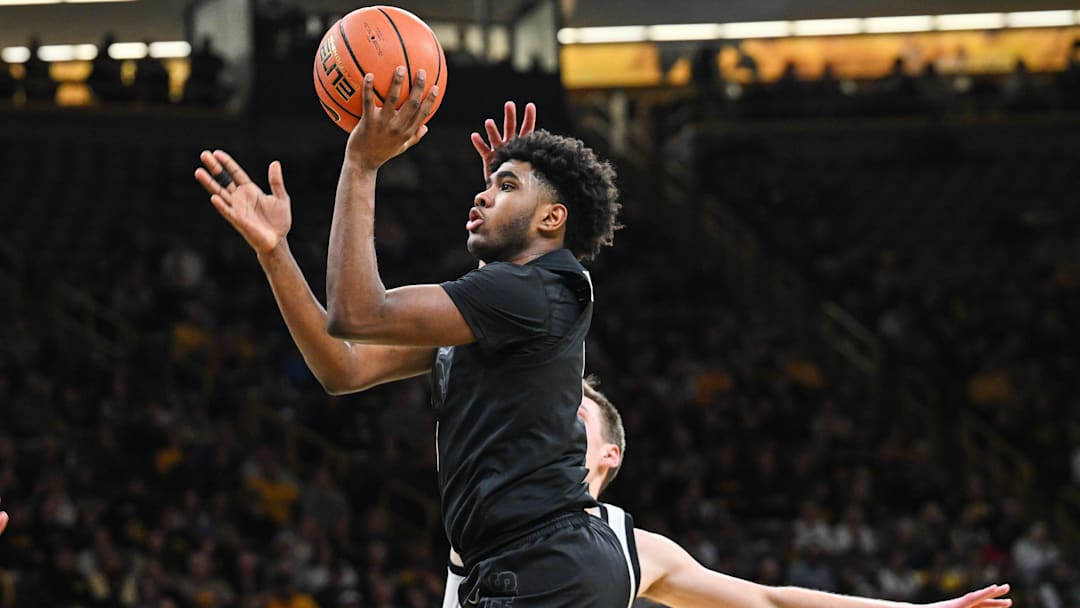 Mar 6, 2025; Iowa City, Iowa, USA; Michigan State Spartans guard Jase Richardson (11) goes to the basket against the Iowa Hawkeyes during the first half at Carver-Hawkeye Arena. Mandatory Credit: Jeffrey Becker-Imagn Images