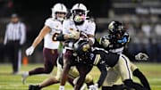 Nov 22, 2025; Boulder, Colorado, USA; Colorado Buffaloes defensive back Makari Vickers (10) tackles Arizona State Sun Devils running back Raleek Brown (3) in the first quarter at Folsom Field. Mandatory Credit: Ron Chenoy-Imagn Images