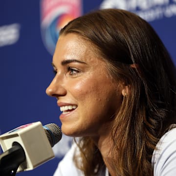 Alex Morgan announces her retirement at a press conference Friday