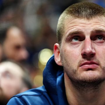 May 4, 2024; Denver, Colorado, USA; Denver Nuggets center Nikola Jokic (15) on the bench in the second half against the Minnesota Timberwolves during game one of the second round for the 2024 NBA playoffs at Ball Arena. 