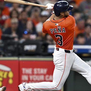 Jun 27, 2025; Houston, Texas, USA; Houston Astros shortstop Jeremy Pena (3) bats in the second inning against the Chicago Cubs at Daikin Park.