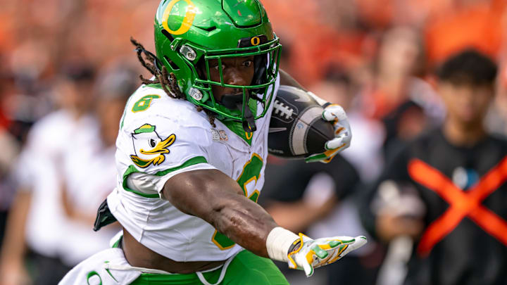 Sep 14, 2024; Corvallis, Oregon, USA; Oregon Ducks running back Noah Whittington (6) runs for a touchdown during the second half against the Oregon State Beavers at Reser Stadium.