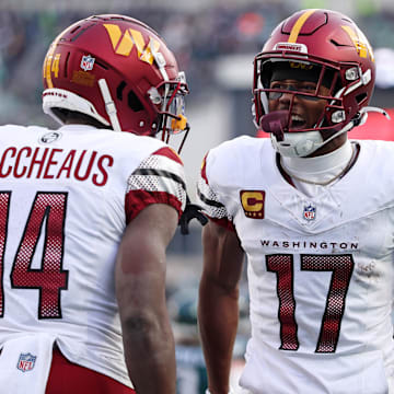 Jan 26, 2025; Philadelphia, PA, USA; Washington Commanders wide receiver Terry McLaurin (17) reacts after a play with wide receiver Olamide Zaccheaus (14) against the Philadelphia Eagles during the first half in the NFC Championship game at Lincoln Financial Field. Mandatory Credit: Bill Streicher-Imagn Images