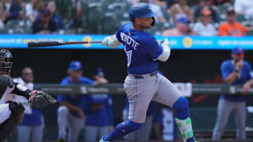 Jul 30, 2025; Baltimore, Maryland, USA; Toronto Blue Jays shortstop Bo Bichette (11) doubles to drive in two runs during the seventh inning against the Baltimore Oriolesat Oriole Park at Camden Yards. Mandatory Credit: Mitch Stringer-Imagn Images