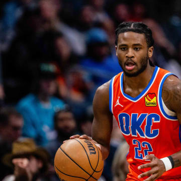 Apr 7, 2024; Charlotte, North Carolina, USA; Oklahoma City Thunder guard Cason Wallace (22) brings the ball up court against the Charlotte Hornets at Spectrum Center. Mandatory Credit: Scott Kinser-USA TODAY Sports