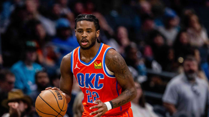 Apr 7, 2024; Charlotte, North Carolina, USA; Oklahoma City Thunder guard Cason Wallace (22) brings the ball up court against the Charlotte Hornets at Spectrum Center. Mandatory Credit: Scott Kinser-USA TODAY Sports