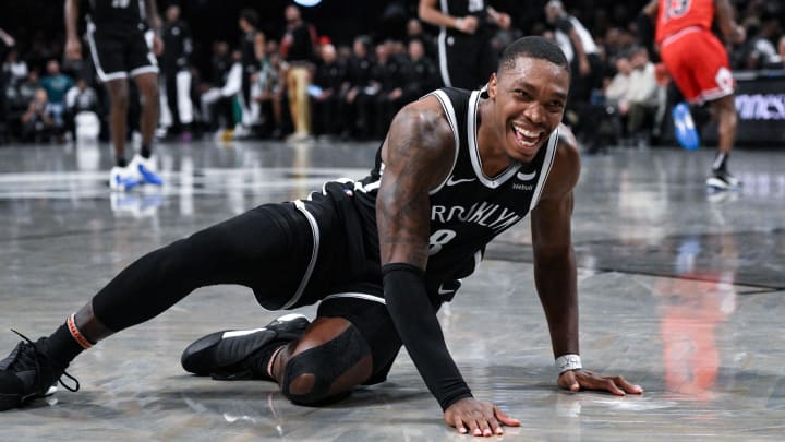 Nov 26, 2023; Brooklyn, New York, USA; Brooklyn Nets guard Lonnie Walker IV (8) reacts after missing a dunk attempt during the second quarter against the Chicago Bulls at Barclays Center. Mandatory Credit: John Jones-USA TODAY Sports