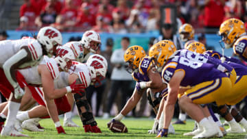 Jan 1, 2024; Tampa, FL, USA;  the Wisconsin Badgers and LSU Tigers line up in the fourth quarter during the ReliaQuest Bowl at Raymond James Stadium. Mandatory Credit: Nathan Ray Seebeck-USA TODAY Sports