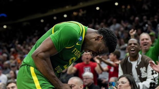Oregon Ducks guard TJ Bamba (5) reacts after a play against the Arizona Wildcats in the second half at Climate Pledge Arena.