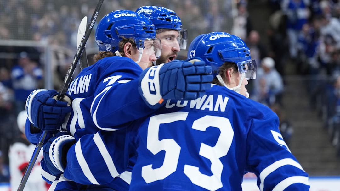 Dec 30, 2025; Toronto, Ontario, CAN; Toronto Maple Leafs center Bobby McMann (74) celebrates after a goal with right wing Easton Cowan (53) against the New Jersey Devils during the first period at Scotiabank Arena. Mandatory Credit: Nick Turchiaro-Imagn Images