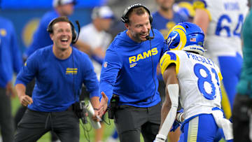 Aug 9, 2025; Inglewood, California, USA;  Los Angeles Rams assistant coach Mike LaFleur and head coach Sean McVay congratulate wide receiver Brennan Presley (81) after a touchdown during the second half against the Dallas Cowboys at SoFi Stadium. Mandatory Credit: Jayne Kamin-Oncea-Imagn Images